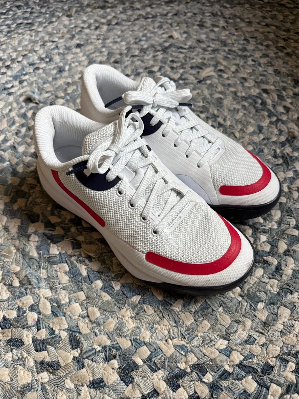 Fila white with navy and red hard court tennis shoes
